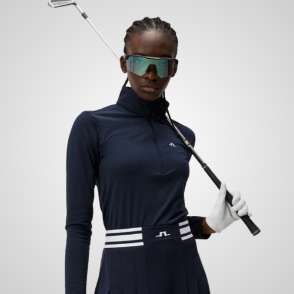 Model wearing J.Lindeberg Ladies Lauryn 1/2 Zip Navy Golf Midlayer Front View