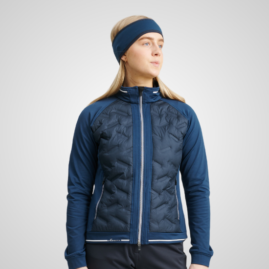 Model wearing Abacus Ladies Grove Hybrid Blue Golf Jacket Front View	