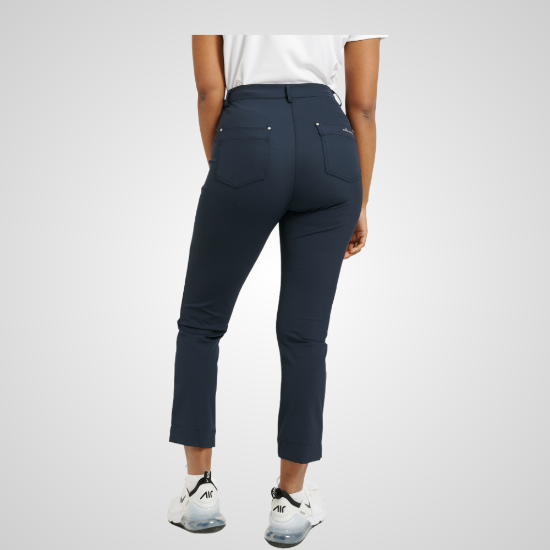 Model wearing Abacus Ladies Elite 7/8 Navy Golf Trousers Back View