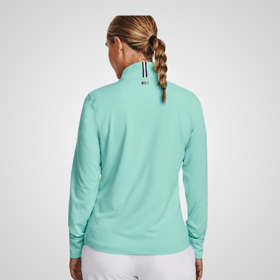 Model wearing Under Armour Ladies Playoff 1/4 Zip Turquiose Golf Pullover Back View