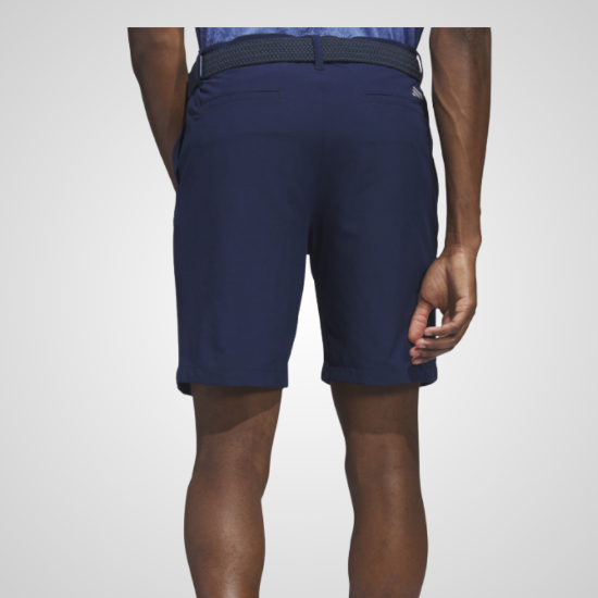 Model wearing adidas Men's Ultimate 365 Navy Golf Shorts Back View