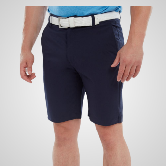 Model wearing FootJoy Men's Par Navy Golf Shorts Front View
