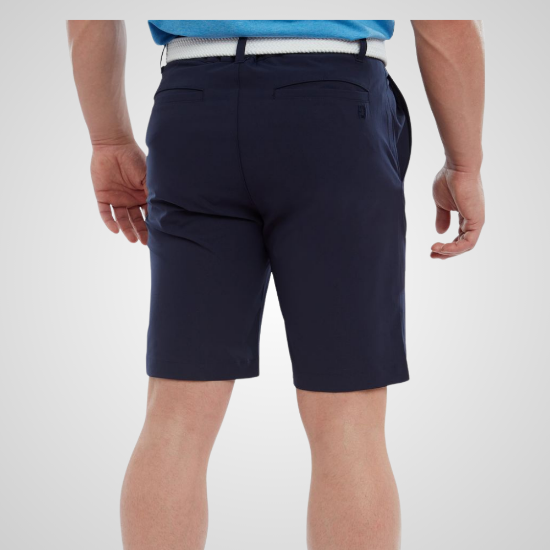 Model wearing FootJoy Men's Par Navy Golf Shorts Back View
