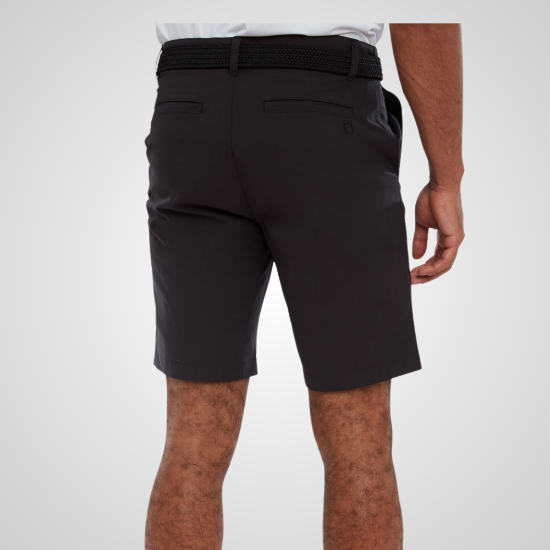 Model wearing FootJoy Men's Par Black Golf Shorts Black View