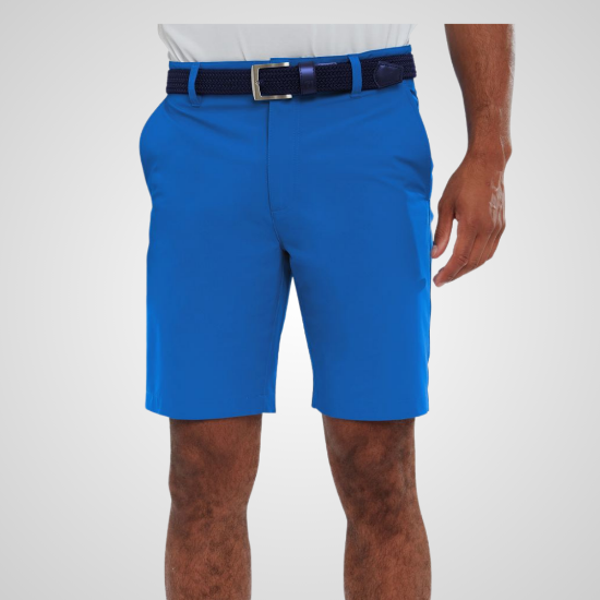 Model wearing FootJoy Men's Par Cobalt Blue Golf Shorts Front View