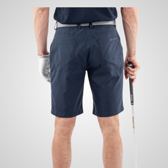 Model wearing Galvin Green Men's Percy V8+ Navy Golf Shorts Back View