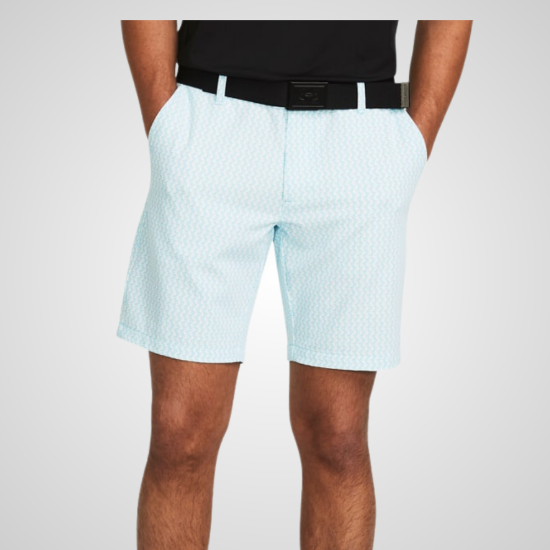 Model wearing Under Armour Men's Drive Printed White Golf Shorts Front View