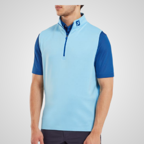 Model wearing FootJoy Men's 1/2 Zip Blue Sky Golf Vest Front View