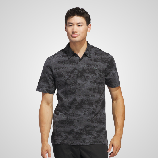 Model wearing adidas Men's Go To Print Mesh Black Golf Polo Shirt Front View