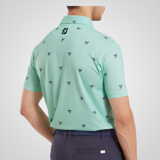 Model wearing FootJoy Men's Thistle Print Lisle Sea Glass Golf Polo Shirt Back View