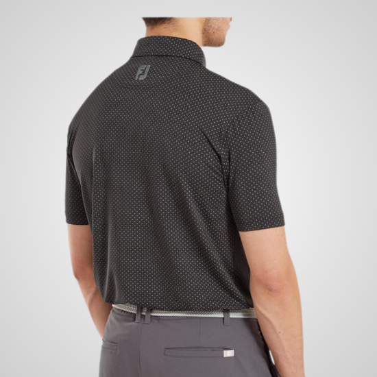 Model wearing FootJoy Men's Stretch Lisle Dot Print Black Golf Polo Shirt Back View