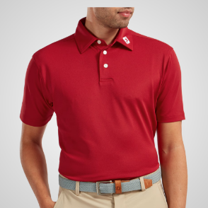 Model wearing FootJoy Men's Stretch Pique Solid Red Golf Polo Shirt Front View