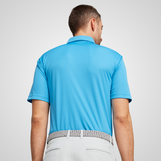 Model wearing Puma Men's Pure Solid Blue Golf Polo Shirt Back View