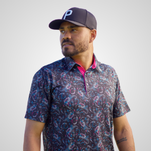 Model wearing Puma Men's Cloudspun Paisley Black Golf Polo Shirt Front View