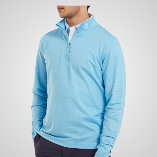 Model wearing FootJoy Men's Glen Plaid Print Chill-Out Blue Sky Golf Pullover Front View