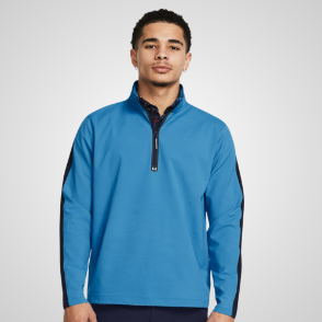 Model wearing Under Armour Men's Storm Windstrike Blue 1/2 Zip Golf Jacket Front View