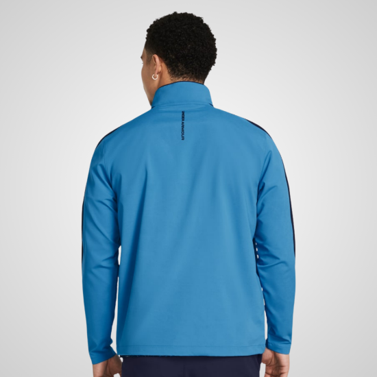 Model wearing Under Armour Men's Storm Windstrike Blue 1/2 Zip Golf Jacket Back View