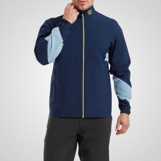 Model wearing FootJoy Men's Hydrolite X Golf Rain Jacket Navy/Slate Front View