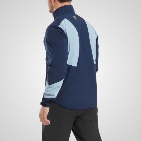 Model wearing FootJoy Men's Hydrolite X Golf Rain Jacket Navy/Slate Rear View