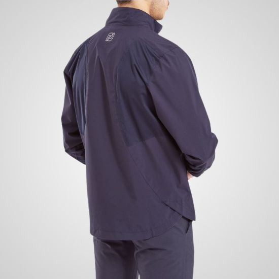 Model wearing FootJoy Men's Hydrolite X Golf Rain Jacket Navy Rear View