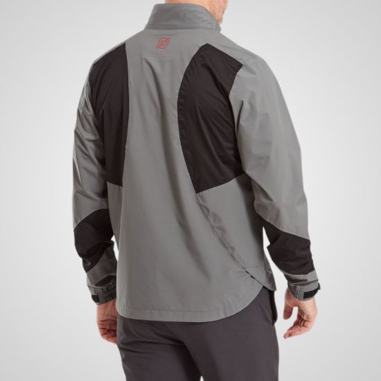 Model wearing FootJoy Men's Hydrolite X Golf Rain Jacket Charcoal Rear View